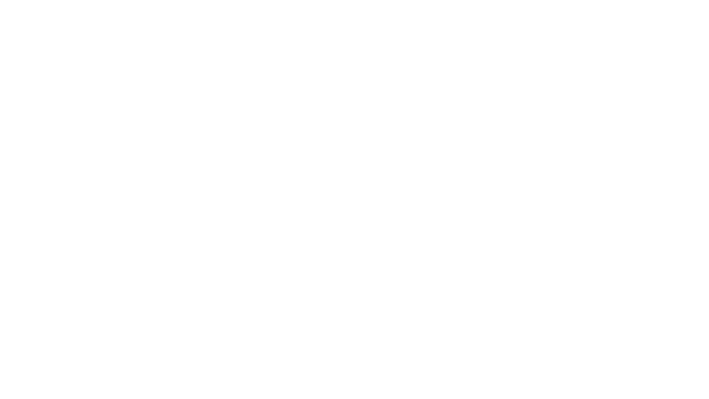 A heavy industrial crushing machine drawn as a CAD wireframe on a perspective ground grid